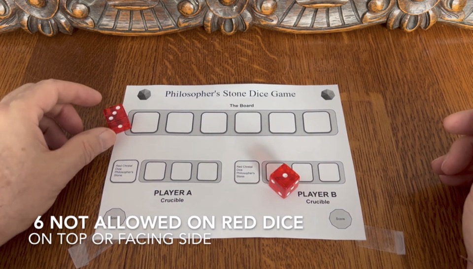 Two Red Crystal dice after setup roll